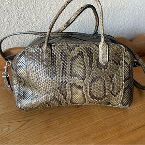B. May Python Hand bag